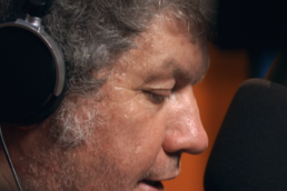 close up of a middle aged male radio DJ