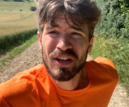 Ivo Graham selfie as he runs up a hill