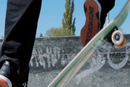 a close up of a skateboard doing a trick