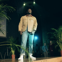 A male model poses at the Slow Fashion Show in Exeter Cathedral.