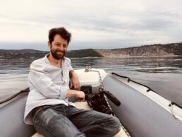 Chris Jones on a boat in Trieste, Italy